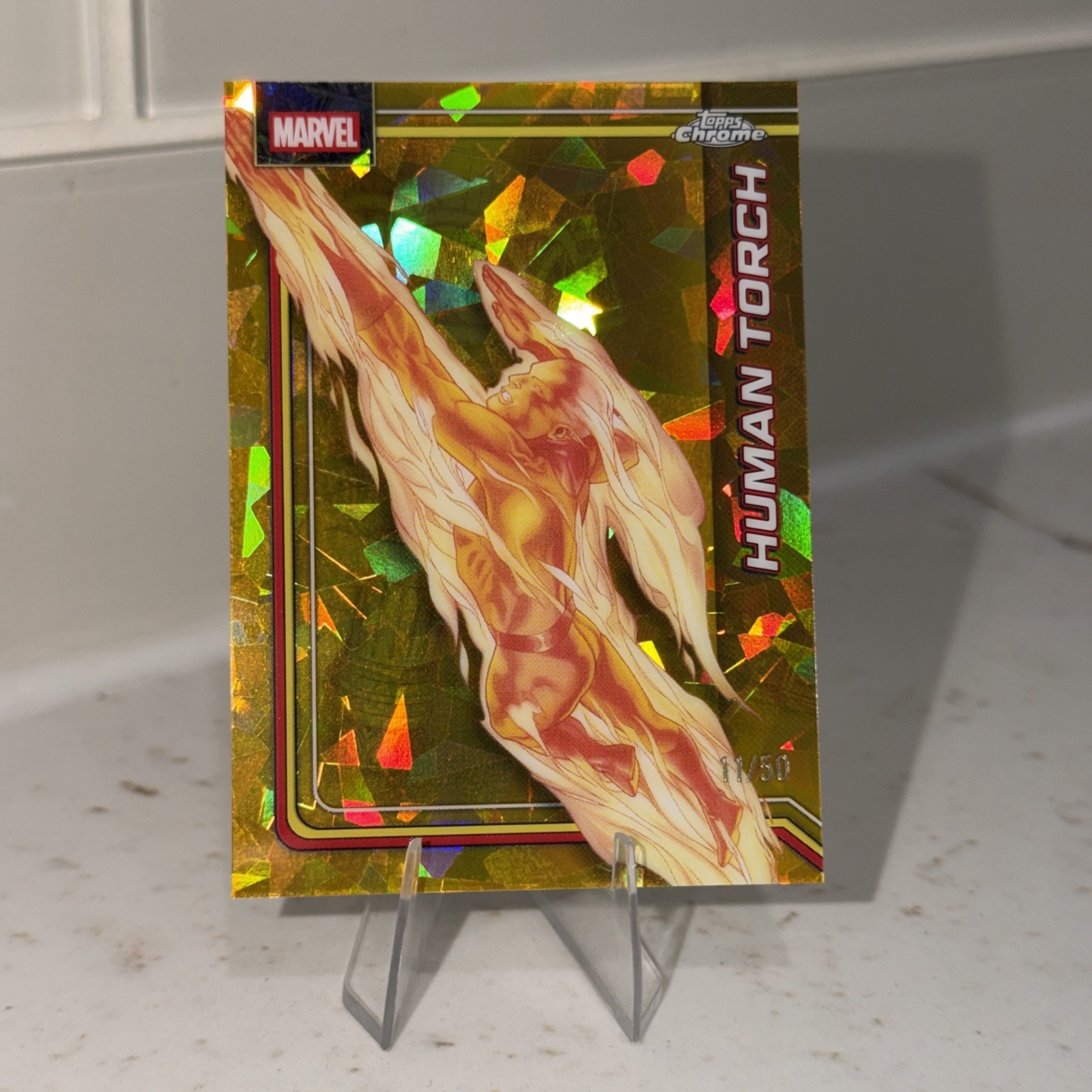 2026 Topps Chrome Marvel Sapphire Human Torch Gold /50