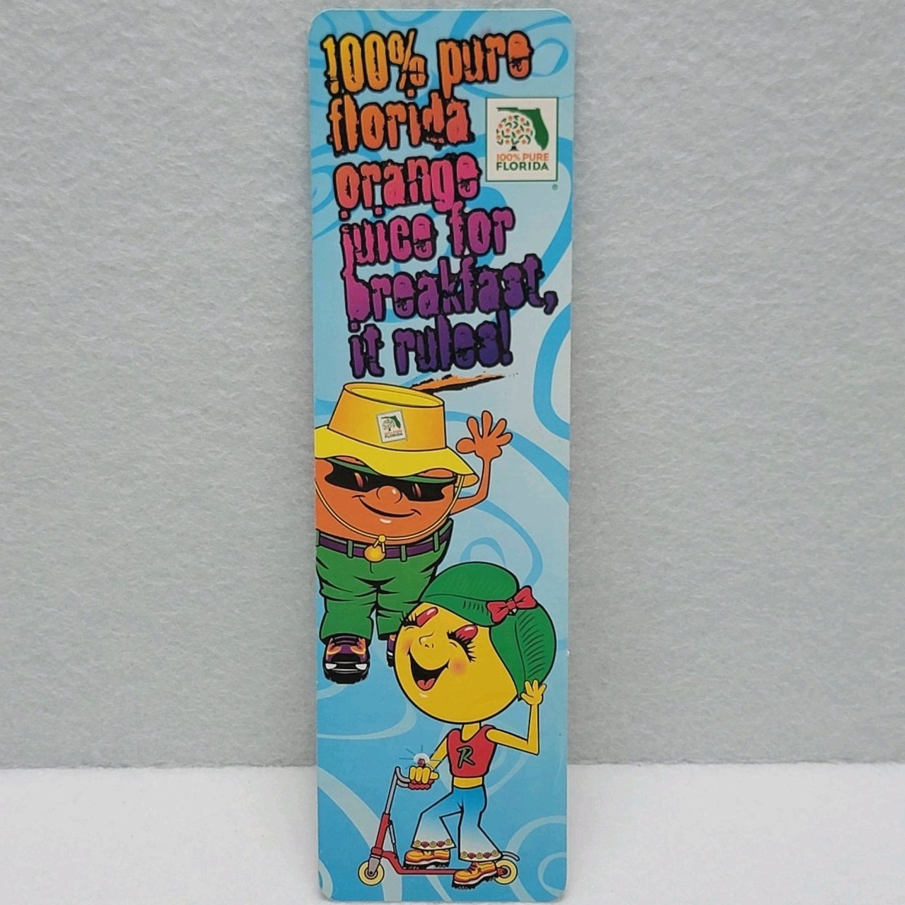 VTG 1996 Florida Orange Juice Bookmark Orangeman Mascot & Girl with Ring Pop