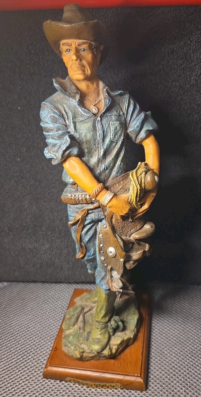Elegante Collection Cowboy Holding Saddle Figurine 12.5