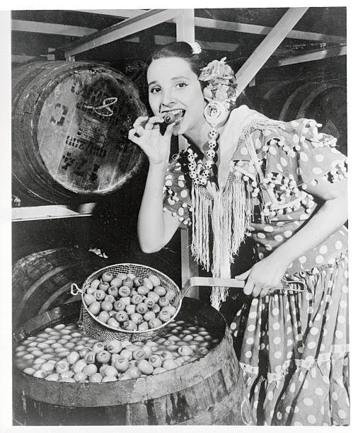 Pretty Maria Luz lends authentic Spanish beauty an opened cask of - Old Photo