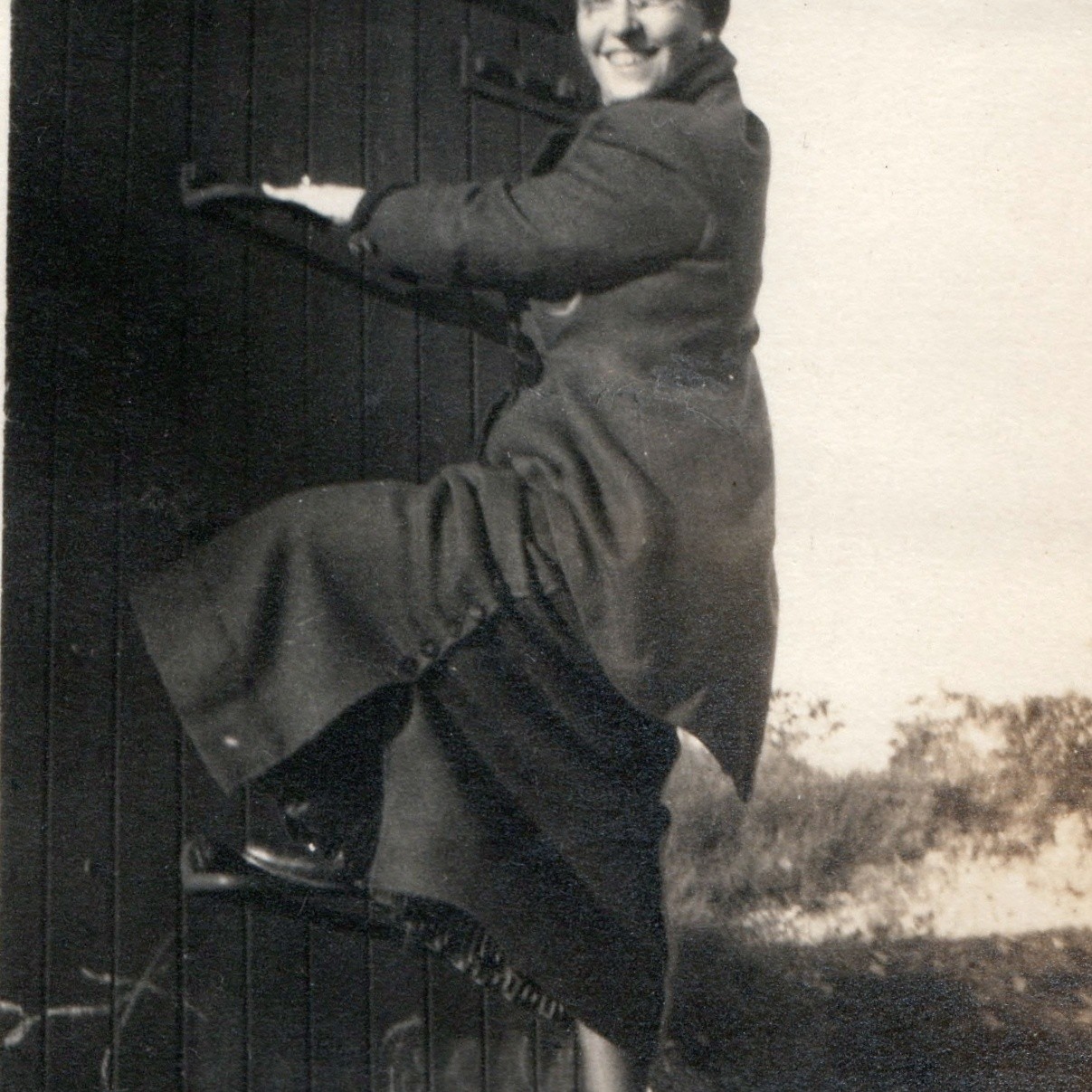 c1920s Smiling Woman Climbing Boxcar Ladder Snapshot Photo Train Railroad Coat c1920s Smiling Woman Climbing Boxcar Ladder Snapshot Photo Train Railroad Coat