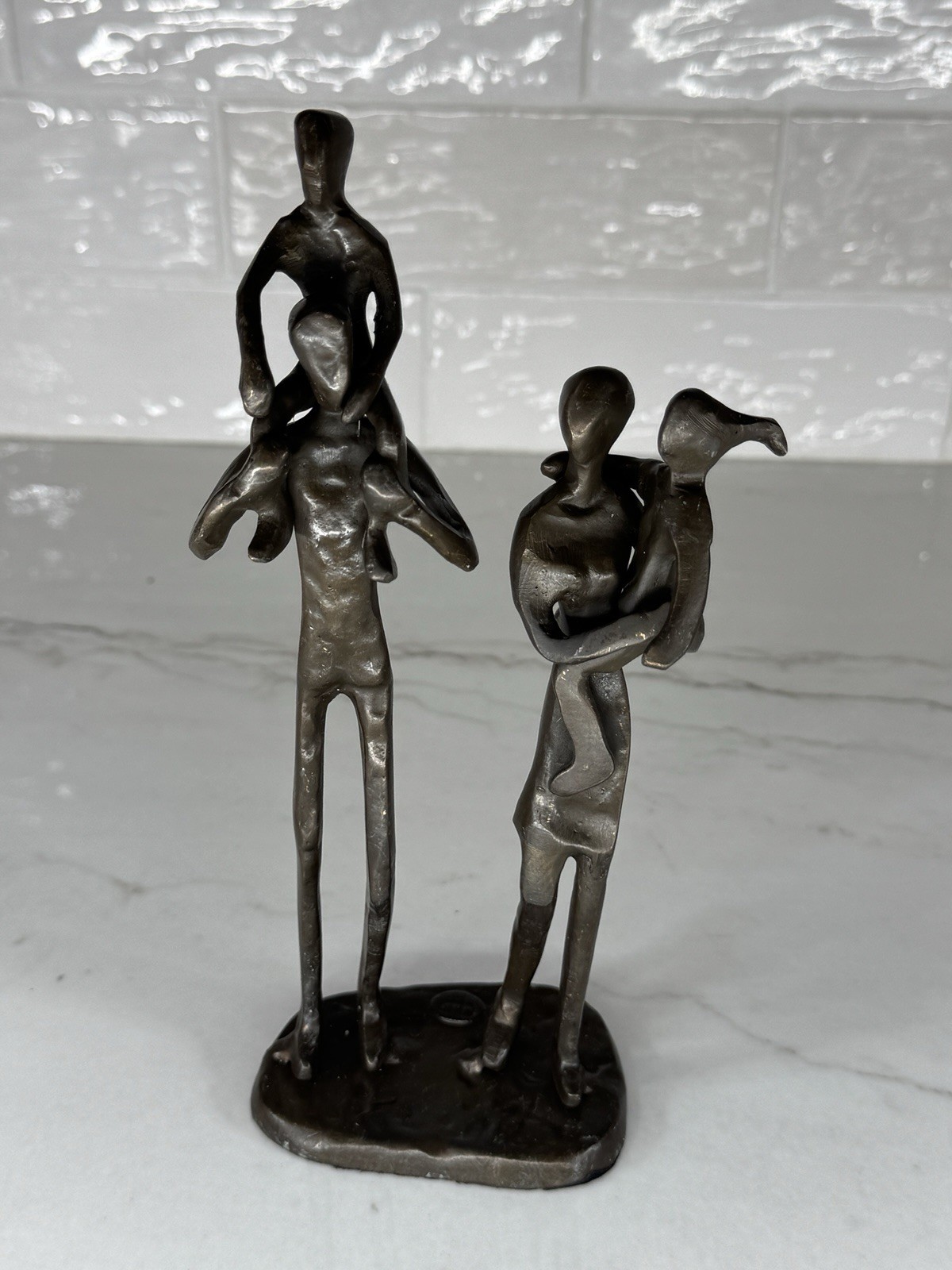 Danya B. Parents Carrying Children Bronze Sculpture Danya B. Parents Carrying Children Bronze Sculpture