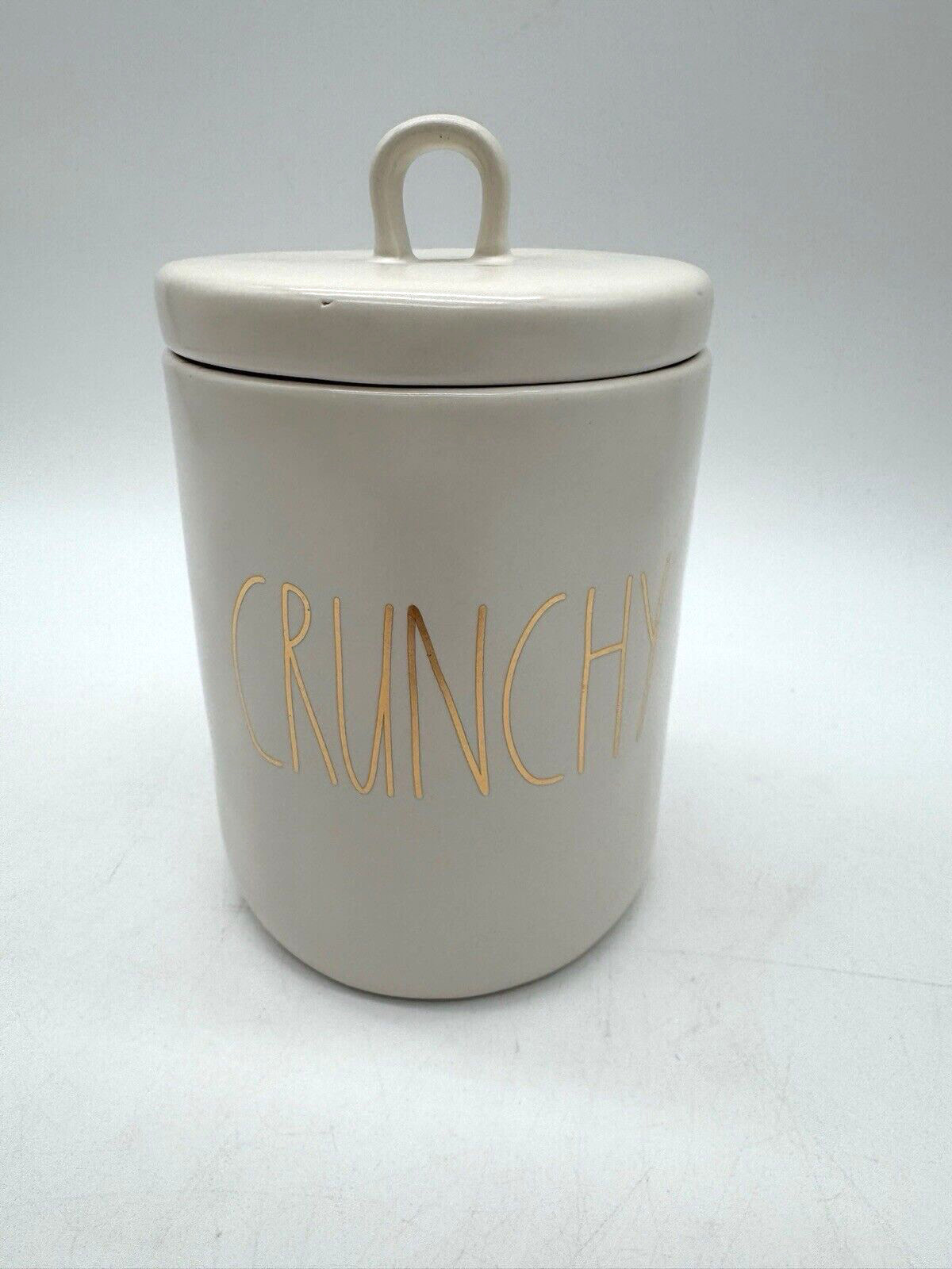 NEW Rae Dunn “CRUNCHY” Storage & Snack Canister Gold Lettering With Loop Lid NIB NEW Rae Dunn “CRUNCHY” Storage & Snack Canister Gold Lettering With Loop Lid NIB
