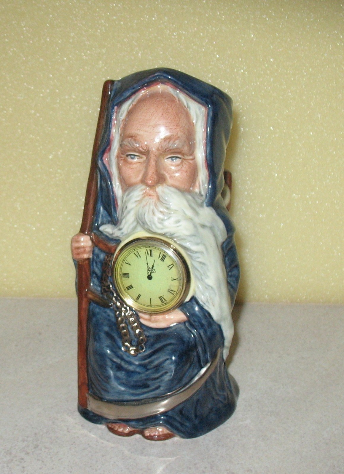 Royal Doulton Seated  Toby Jug OLD FATHER TIME, with Clock D7069