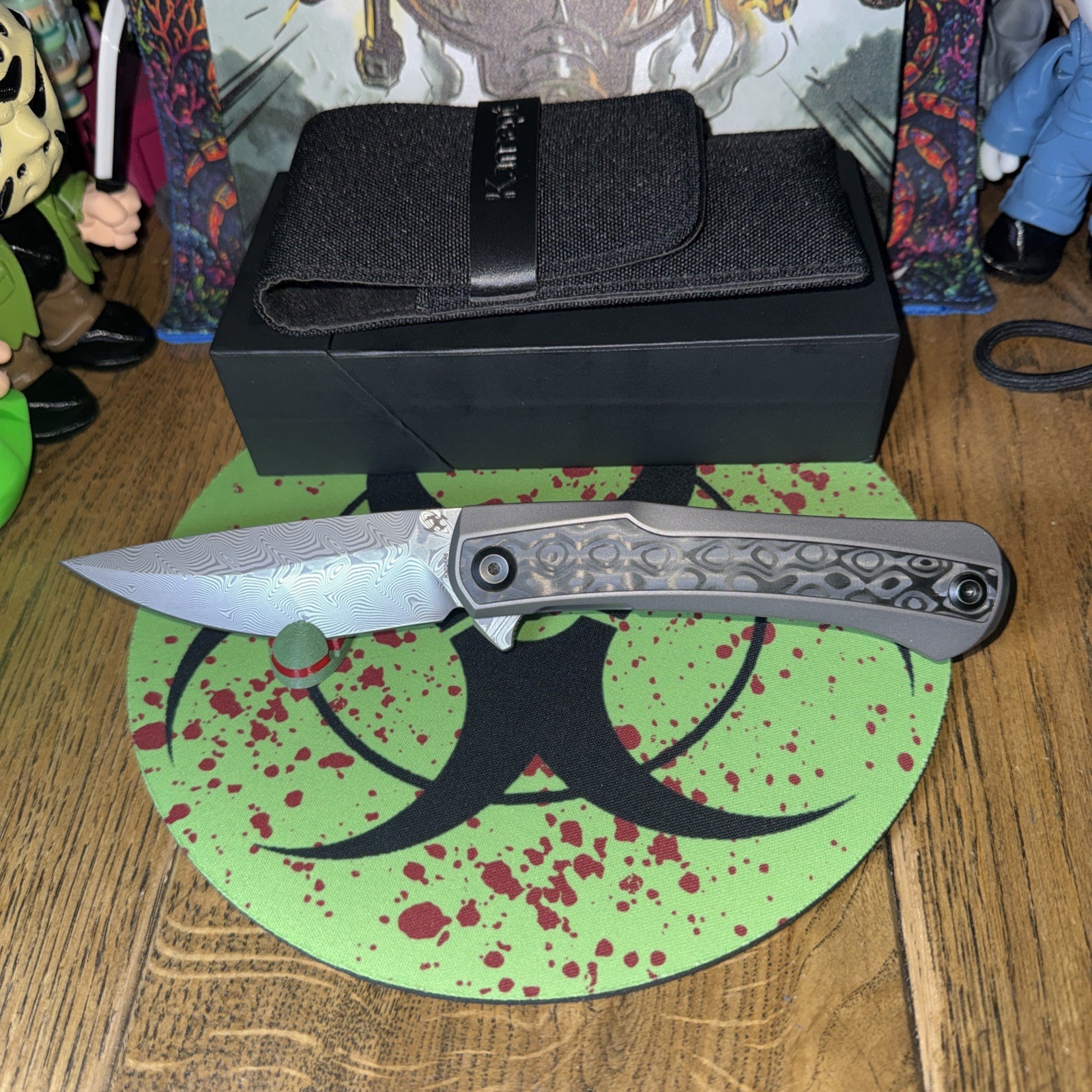 Kansept Kratos K1024A5 Titanium Handle Black Rose Carbon Fiber Inlay. Damascus