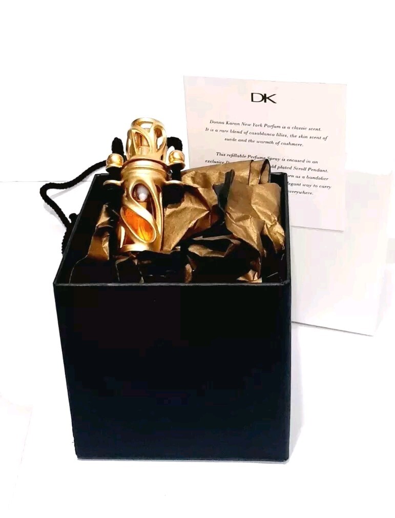 Vintage Donna Karan 1/8 oz Parfum Signature Filigree Pendant 24K Gold Plate Vintage Donna Karan 1/8 oz Parfum Signature Filigree Pendant 24K Gold Plate