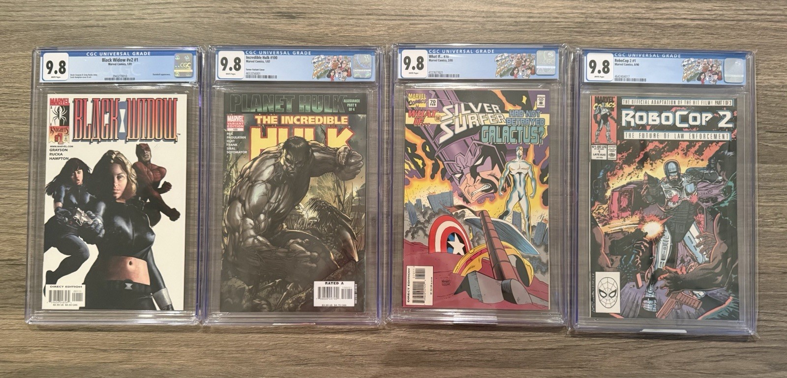 Marvel CGC 9.8 Comic Slab Lot of 4 Black Widow, Hulk, Silver Surfer, & Robocop Marvel CGC 9.8 Comic Slab Lot of 4 Black Widow, Hulk, Silver Surfer, & Robocop