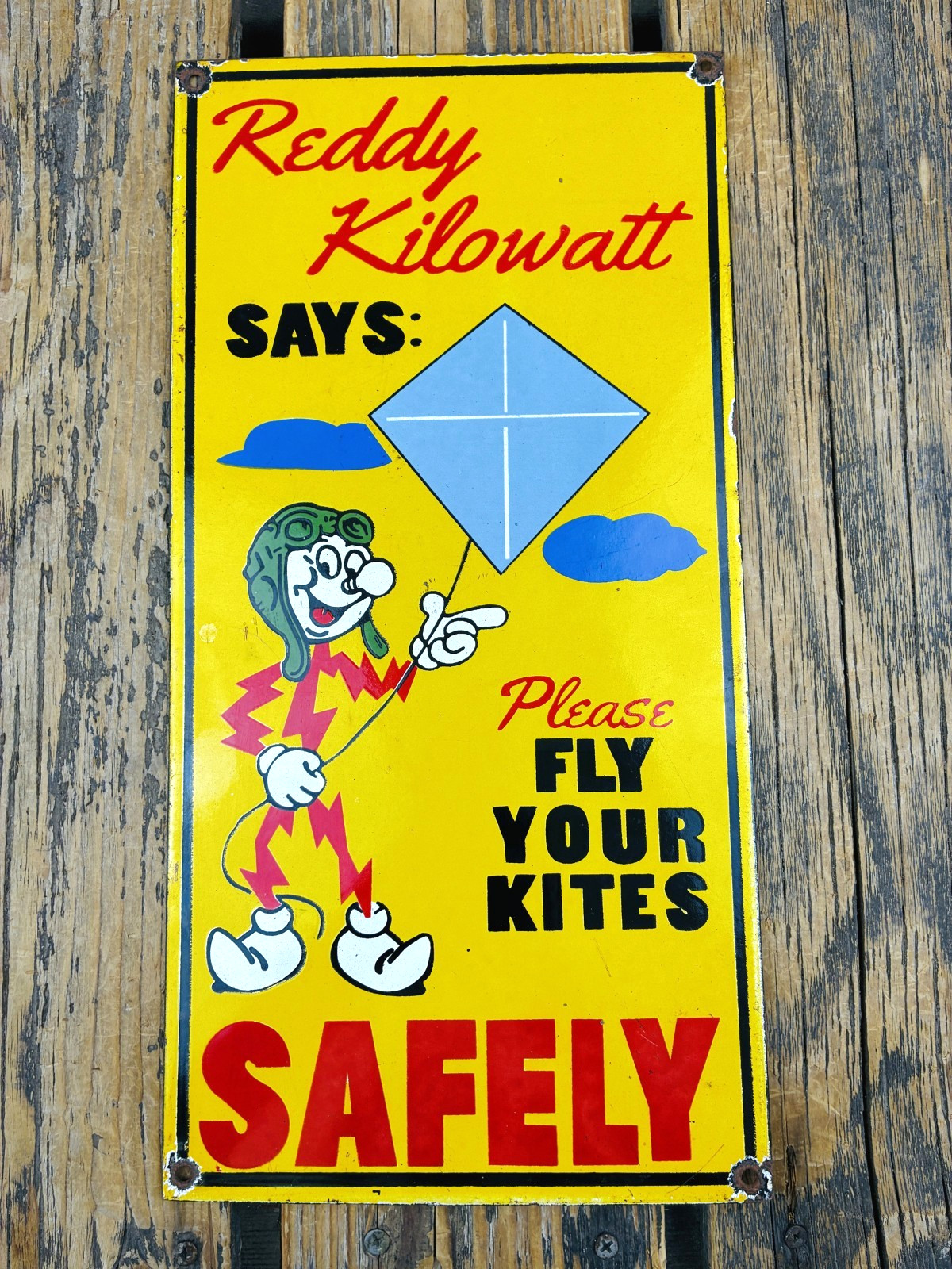 VINTAGE 16X8” REDDY KILOWATT FLY KITES SAFELY ELECTRIC GAS OIL PORCELAIN SIGN