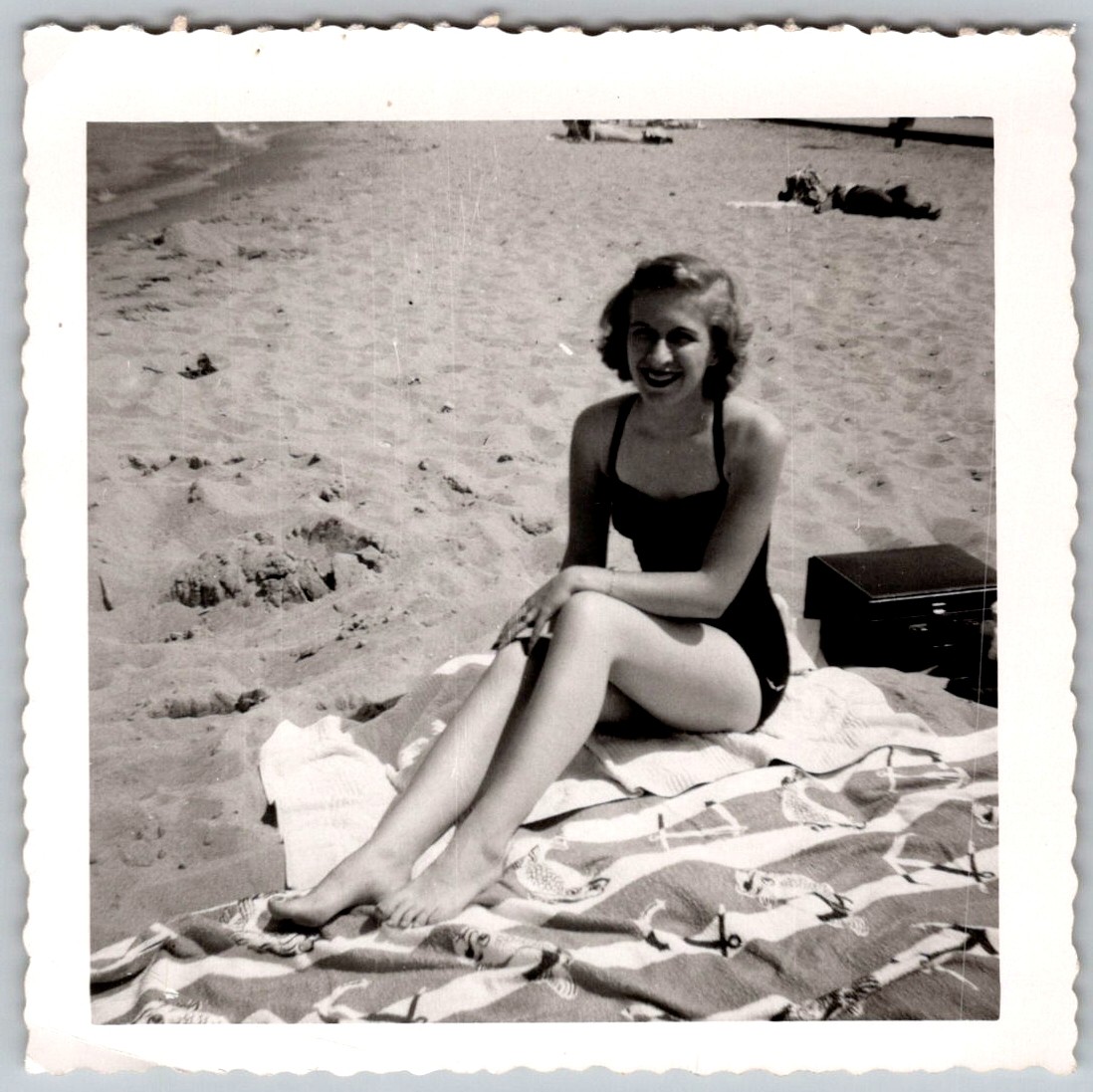 Vtg B&W Snapshot Pretty Smiling Woman Swimsuit Beach Blanket July 1952 Vtg B&W Snapshot Pretty Smiling Woman Swimsuit Beach Blanket July 1952