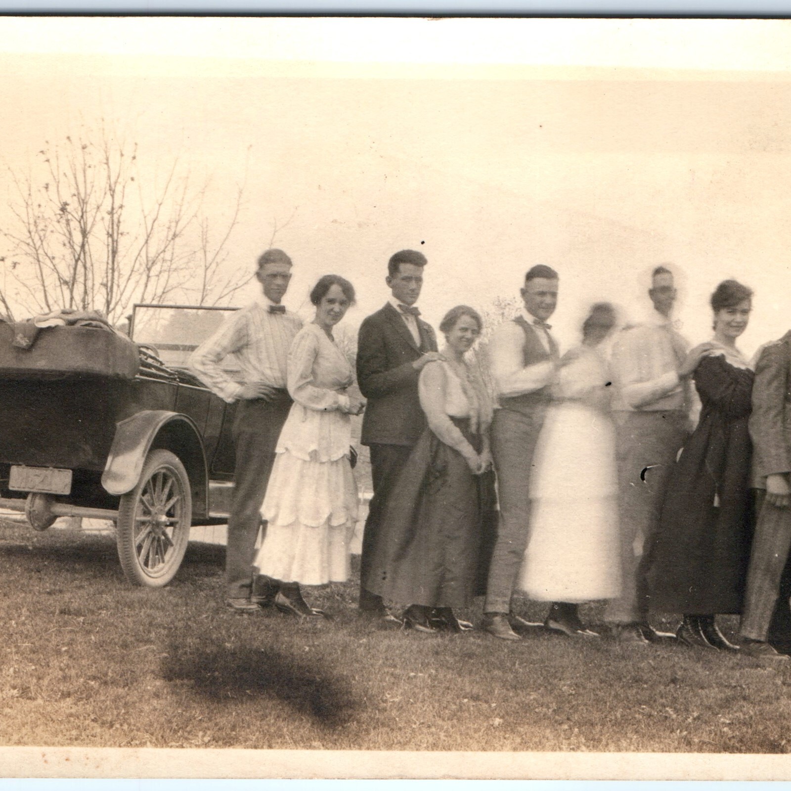 c1910s Group of Couples posing with Touring Car Antique RPPC Postcard