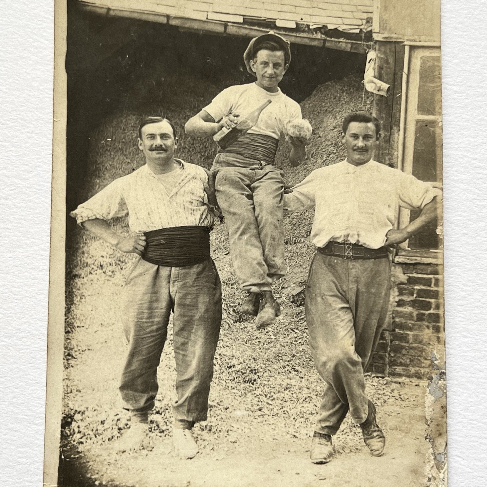 Antique RPPC Photograph Postcard Handsome Men Wine Performers Odd Acrobat