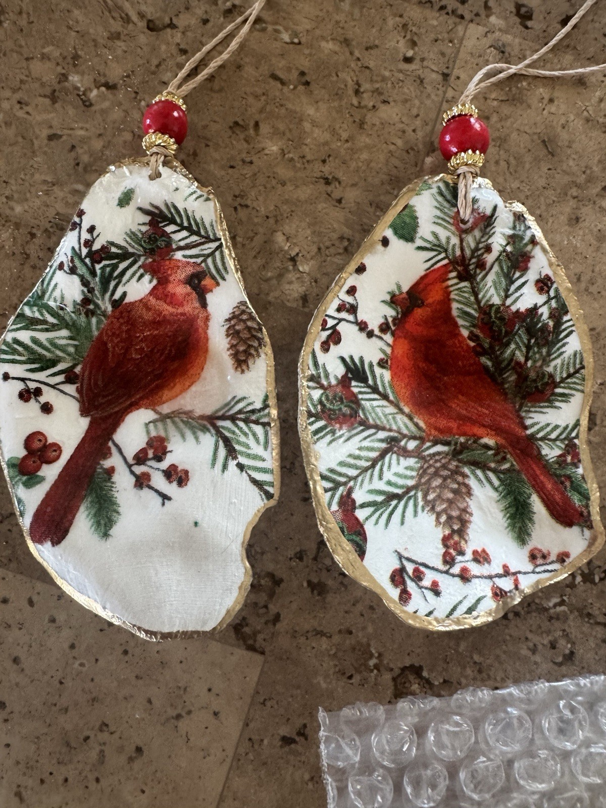 Decoupaged set of two oyster seashell Ornaments with RED CARDINALS Decoupaged set of two oyster seashell Ornaments with RED CARDINALS