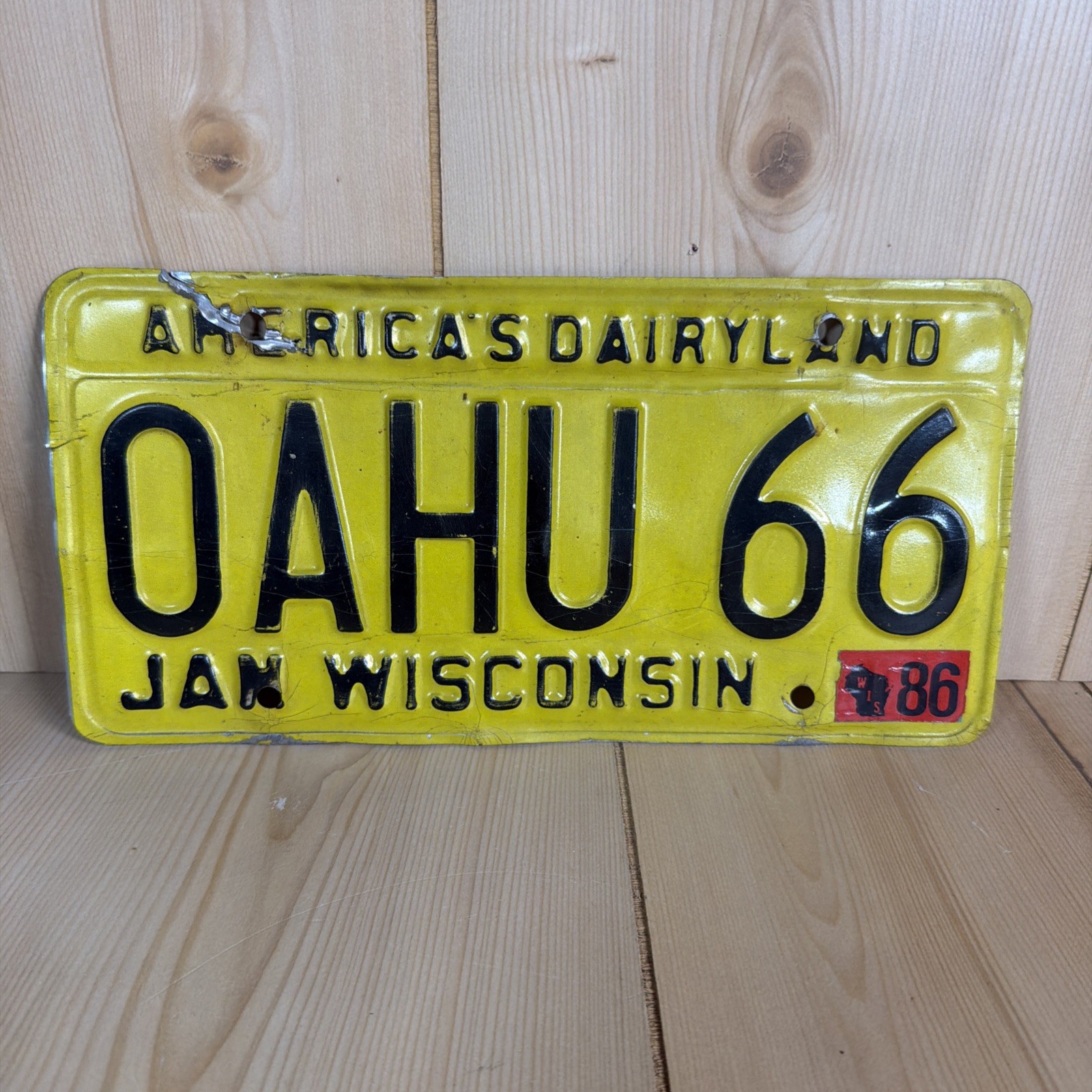 Vintage 1986 Wisconsin Yellow License Plate America's Dairyland Custom Oahu 66