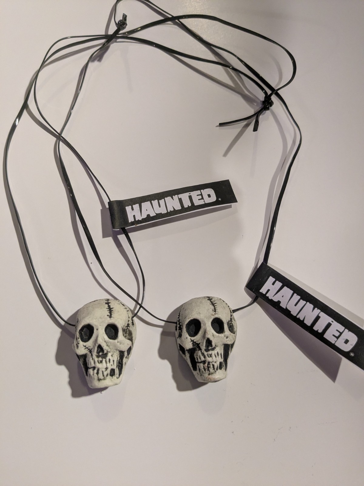 Haunted glow skull necklace x 2 randotti copy creepy
