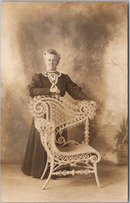 c1910s Studio Real Photo RPPC Postcard Woman / Wicker Chair \