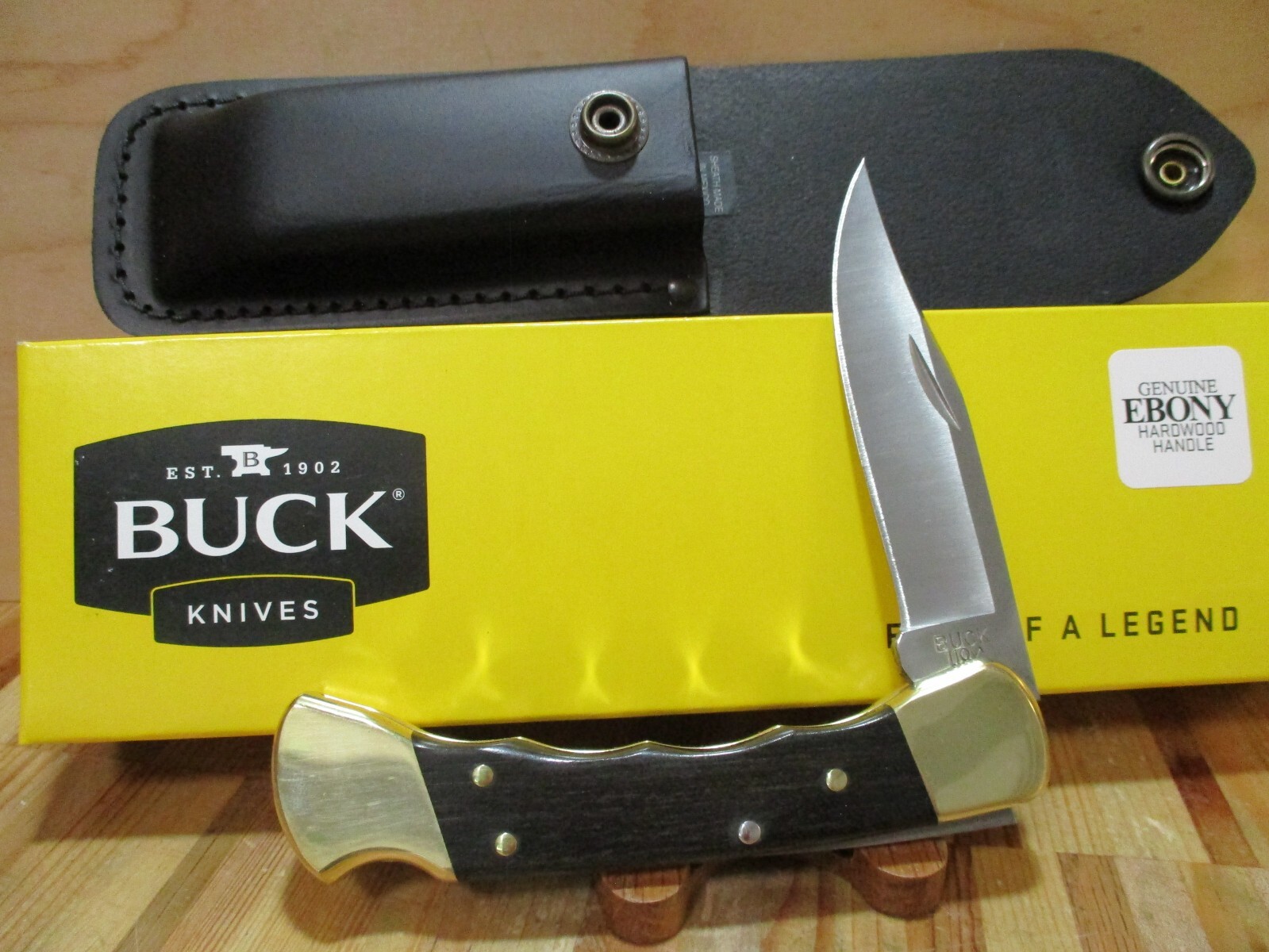 NIB Buck Ebony Finger Groove 110 Folding Hunting/Pocket Knife and Sheath - 2538 NIB Buck Ebony Finger Groove 110 Folding Hunting/Pocket Knife and Sheath - 2538