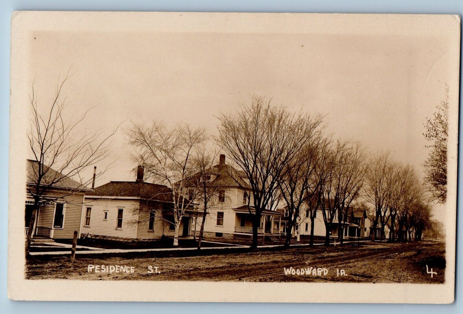 Woodward Iowa IA Postcard RPPC Photo Residence Street Houses Dirt Road c1930\'s