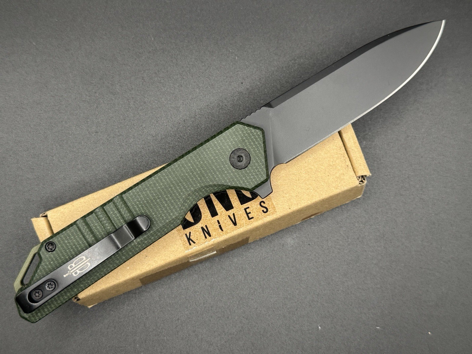 BNB Palisade Ti Coated D2 OD Green G10 Button Lock Drop Point BNB Palisade Ti Coated D2 OD Green G10 Button Lock Drop Point