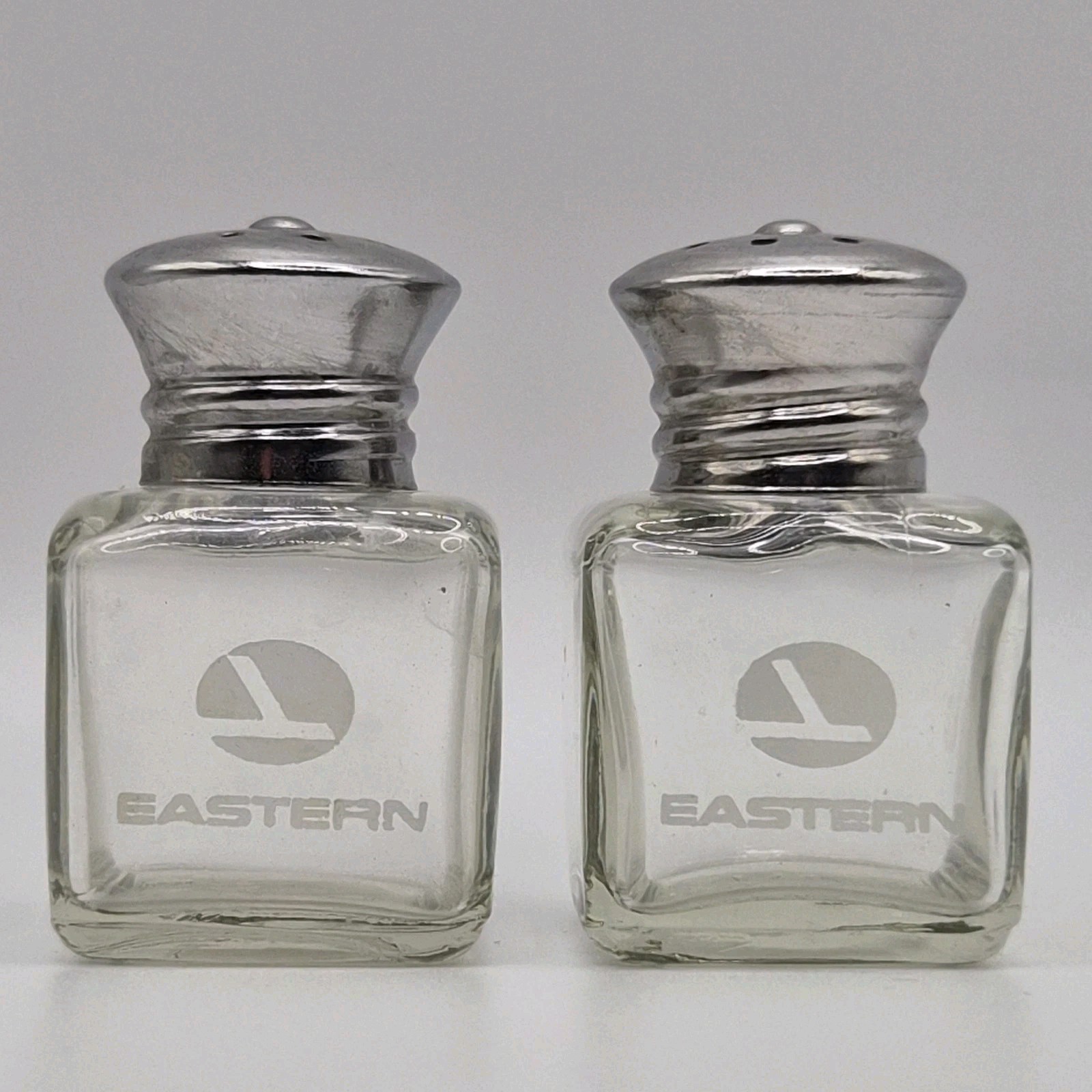 Vintage Eastern Airlines First Class Salt & Pepper Shakers Glass Airplane Logo Vintage Eastern Airlines First Class Salt & Pepper Shakers Glass Airplane Logo