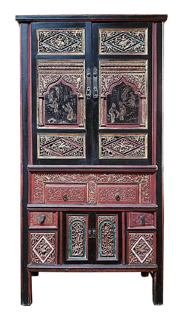 A Two Door Carved Wooden Cabinet A Two Door Carved Wooden Cabinet
