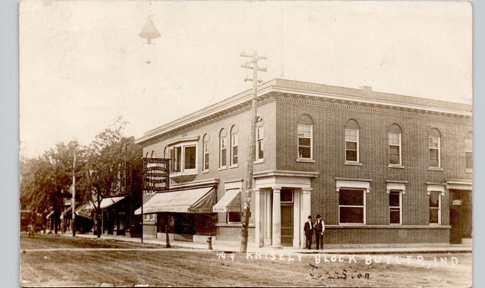 DOWNTOWN STREET CORNER butler, in c1910 postcard indiana real photo rppc knisely