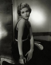 Actress Joan Bennett wearing a sleeveless black dress with a lam 1930s Old Photo picture