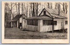 RPPC Wood Frame Cottage w/ Enclosed Porch in Woods Real Photo Postcard AZO c1910 picture