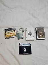 Lot of five zippo and other brand lighters picture