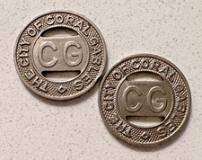 TWO VINTAGE CITY OF CORAL GABLES 1/2 INTERURBAN OR 1 LOCAL FARE TRANSIT TOKENS picture