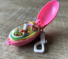 2002 Sanrio Hello Kitty Takara Pocket Critter Moving Keychain Garden Vintage picture