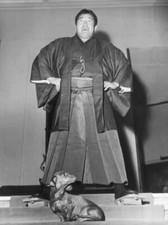 Japanese wrestling champion Rikidozan towers over a small dachs- 1956 Old Photo picture