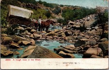 1901 Leavenworth KS Covered Wagon Rough Road West Postcard Adolph Selige picture