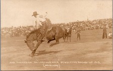 1919 Pendleton Round-Up RPPC Dan Thompson on Leather Neck Rodeo Cowboy picture