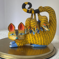  Oaxacan wood-carved alebrije depicting a possum with three babies picture