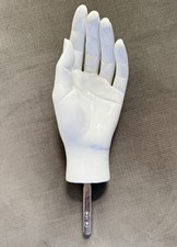 Vintage Female (Left) Mannequin Hand Stark White Glossy Base is a metal stake picture