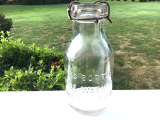 Early milk bottle with original wire bail clip circa 1900 slug plate picture