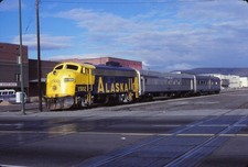 ALASKA   1502  F7A   & TWO CARS     @  YAKAMA, WA 1986 35MM SLIDE picture