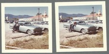 Lot of 2 VTG 1960s Photos OLDER COUPLE POSING WITH THEIR BLUE CAR IN PARKING LOT picture