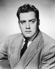 Canadian actor Raymond Burr wears a pinstriped suit a promotional h- Old Photo picture