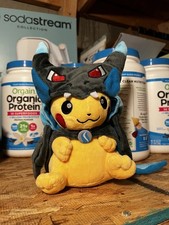 Pikachu wearing Mega Charizard X Poncho Plush picture