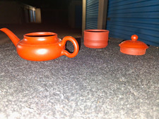 yixing purple clay tea pots collectors edition. with cetificates of authenticity picture