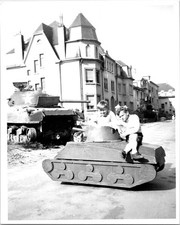 Three young boys sitting in small tank after war ended B+W Found Photo VB354 picture