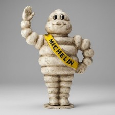 Michelin Man 1889 Cast Iron Coin Bank — 8.5