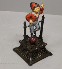 Antique Cast Iron Boy on Trapeze Mechanical Bank picture