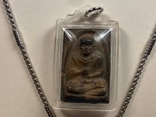 Old Thai Sitting Buddha Amulet with a New 24