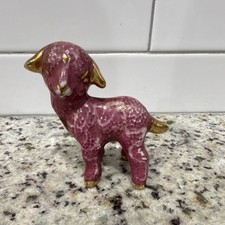 Vintage mid-20th-century pink ceramic lamb figurine. Pink glaze and gold trimmed picture