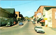 Bracebridge, Ontario Canada MAIN STREET SCENE Stores & 50's Cars Postcard picture