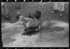 Photo:Vale Oregon 1941 Fourth of July Greased Pig Race Boy and Pig picture