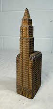 Antique 1910 Gold tone Cast Iron Still Coin Penny Bank Woolworth Building Kenton picture