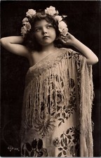 CUTE YOUNG GIRL :LOVELY FRINGED FLORAL DRESS : ROSES IN HER HAIR : RPPC : (1908) picture
